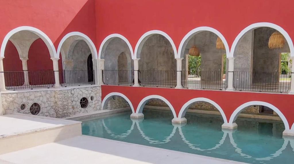 Bazen u objektu Wakax Hacienda - Cenote & Boutique Hotel - Small Luxury Hotels of the World ili u blizini