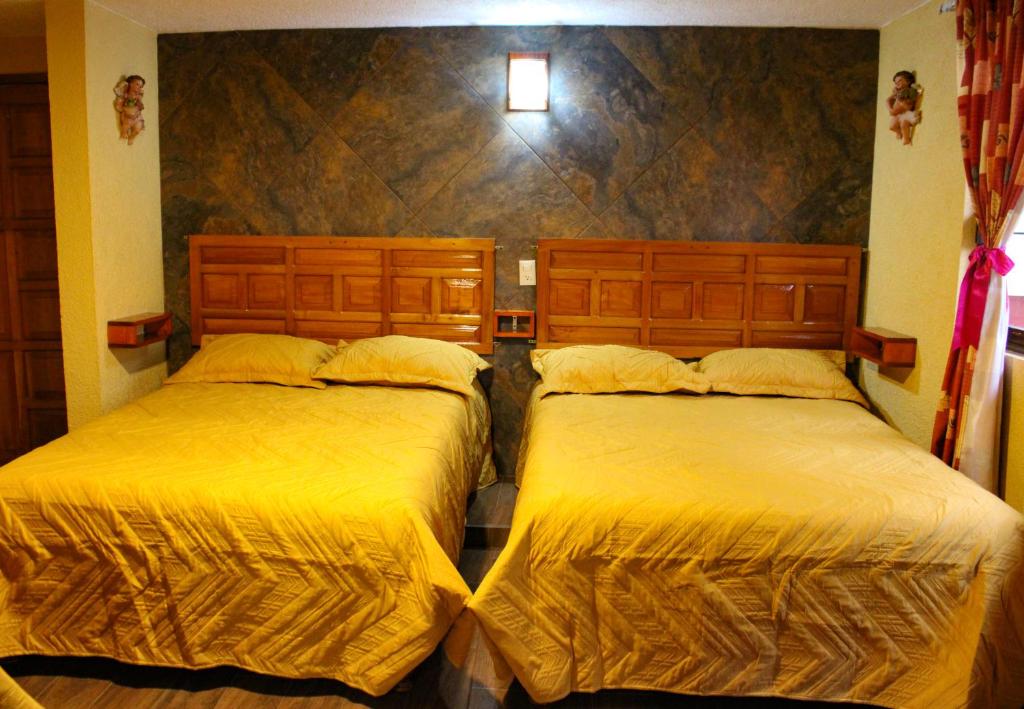 Letto o letti in una camera di Hospedaje Ensueño