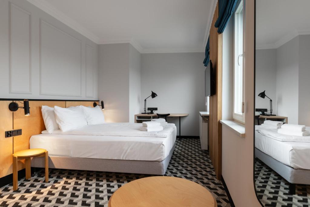 Posteľ alebo postele v izbe v ubytovaní Hotel Tulip Residences Warsaw Targowa