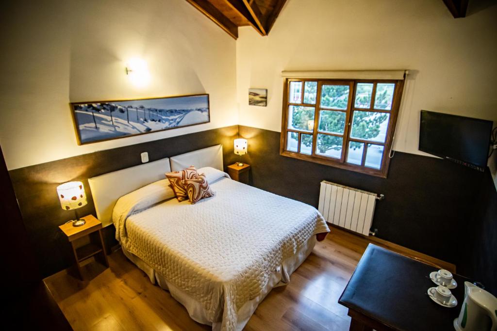 Cama ou camas em um quarto em Las Avutardas Hosteria
