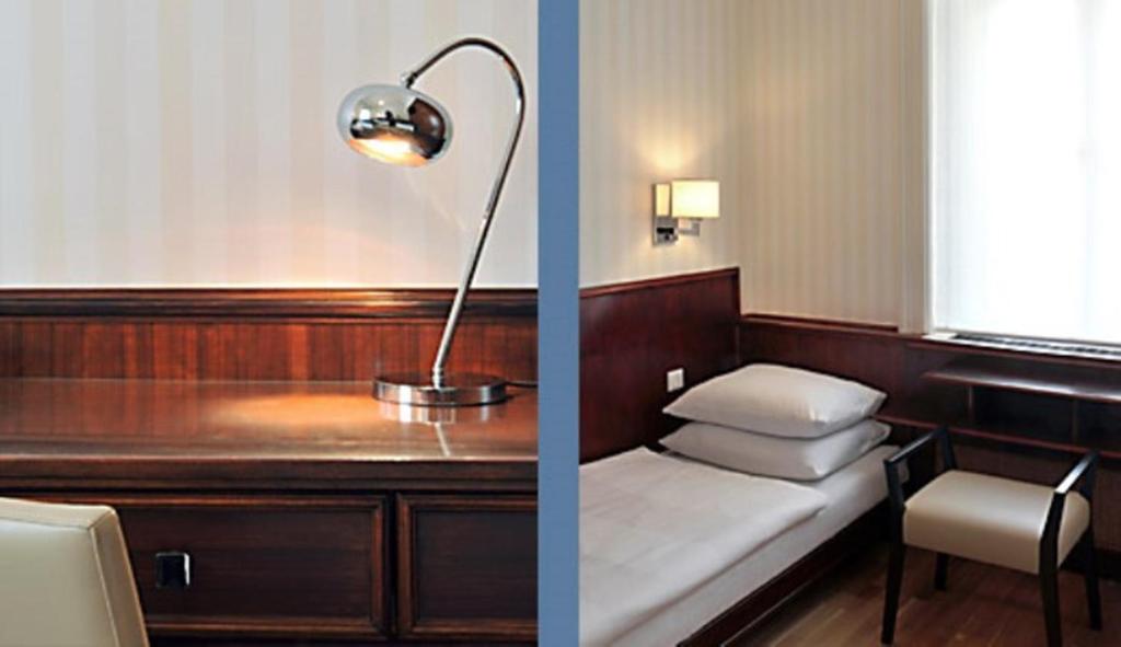 Postel nebo postele na pokoji v ubytování Hotel Kärntnerhof