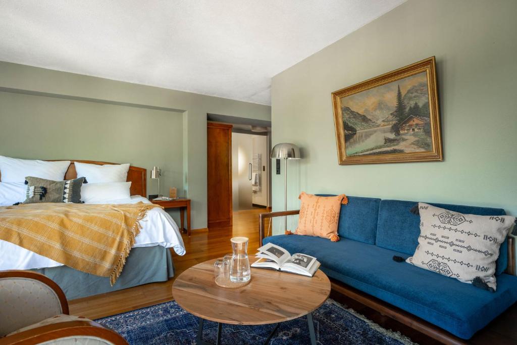 Postel nebo postele na pokoji v ubytování Boutique Hotel Bellevue Lermoos