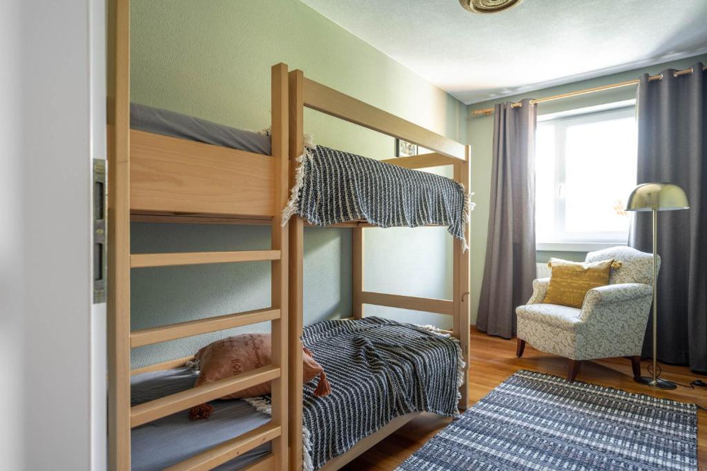 Postel nebo postele na pokoji v ubytování Boutique Hotel Bellevue Lermoos