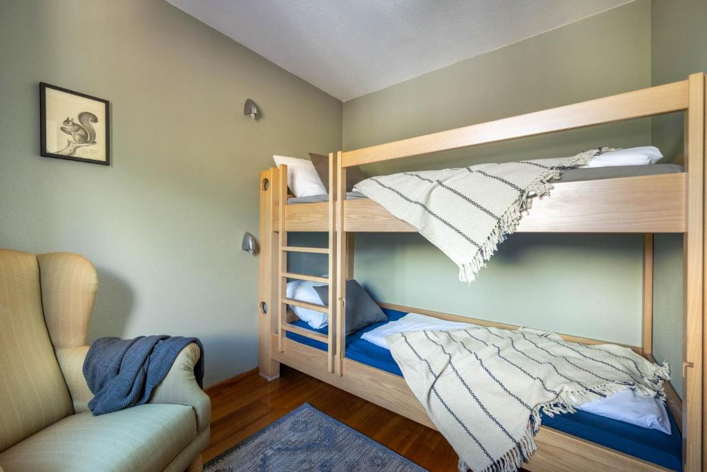 Postel nebo postele na pokoji v ubytování Boutique Hotel Bellevue Lermoos