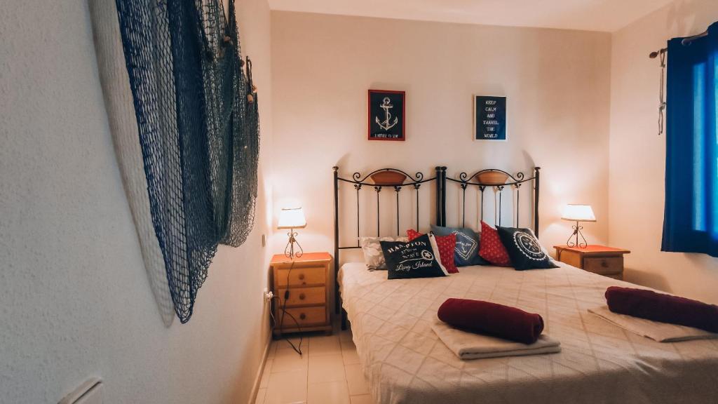 Posteľ alebo postele v izbe v ubytovaní Sunny Time La Mata