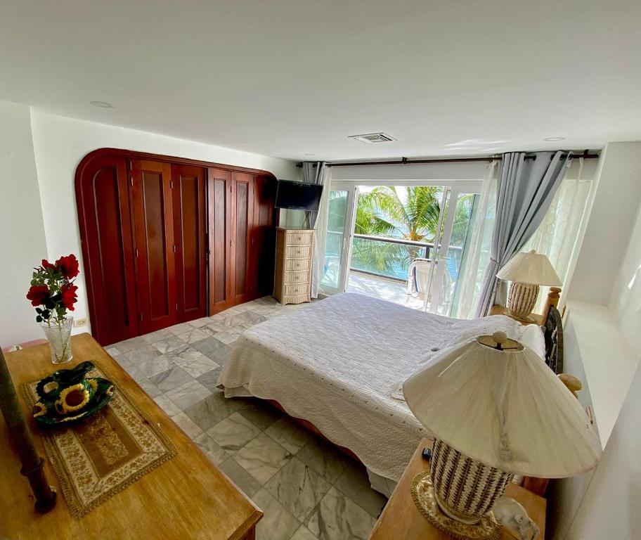 Postel nebo postele na pokoji v ubytování Exclusivos Apartamentos con playa privada