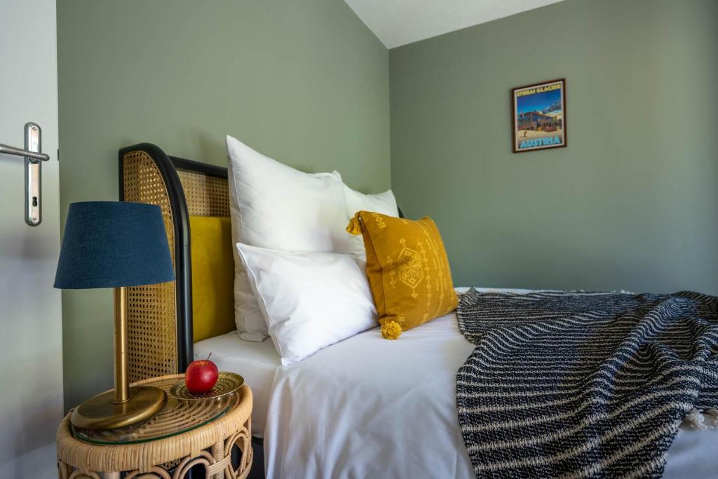 Postel nebo postele na pokoji v ubytování Boutique Hotel Bellevue Lermoos