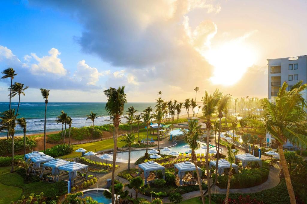 an aerial view of the resort and the beach at Wyndham Grand Rio Mar Rainforest Beach and Golf Resort in Rio Grande