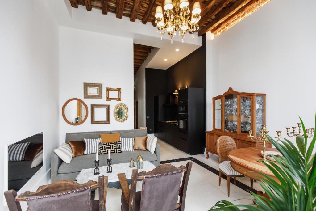 Posezení v ubytování La Colonial Suites Apartamentos de Lujo