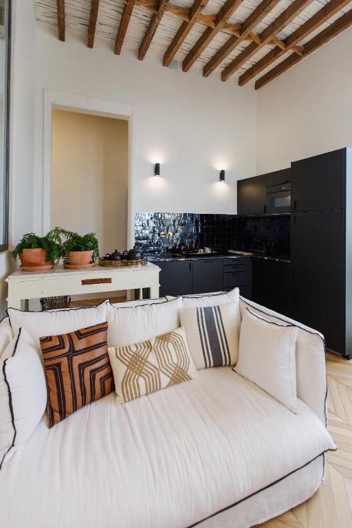 Kuchyň nebo kuchyňský kout v ubytování La Colonial Suites Apartamentos de Lujo