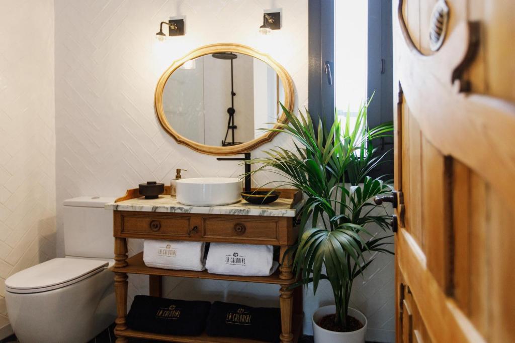 Koupelna v ubytování La Colonial Suites Apartamentos de Lujo