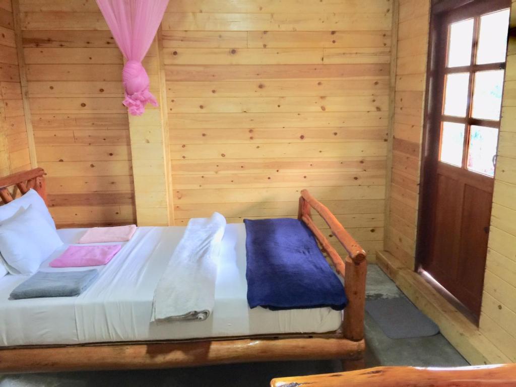 Postel nebo postele na pokoji v ubytování Ella nature nest