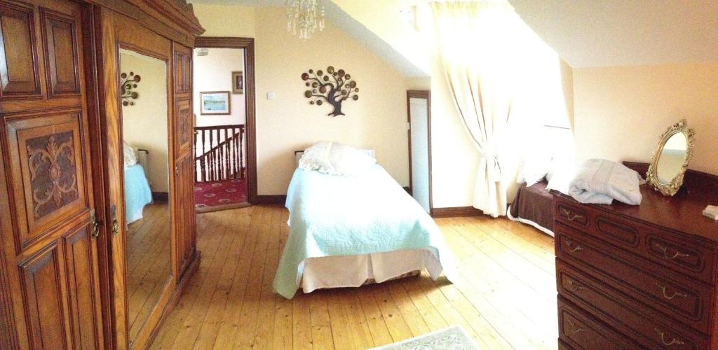 Postel nebo postele na pokoji v ubytování White Hill Country House B&B