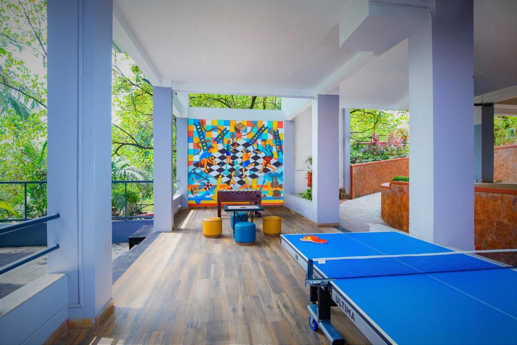 Stolní tenis v ubytování Amoravida By 7 Apple Resorts, Goa nebo okolí