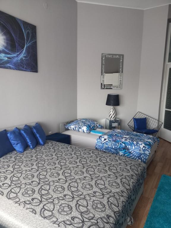 Postel nebo postele na pokoji v ubytování ANKER SILVER DREAM