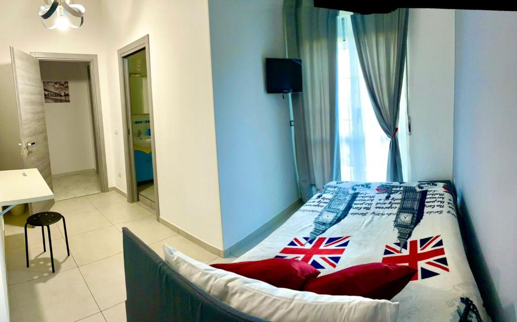 A bed or beds in a room at Affittacamere Iria