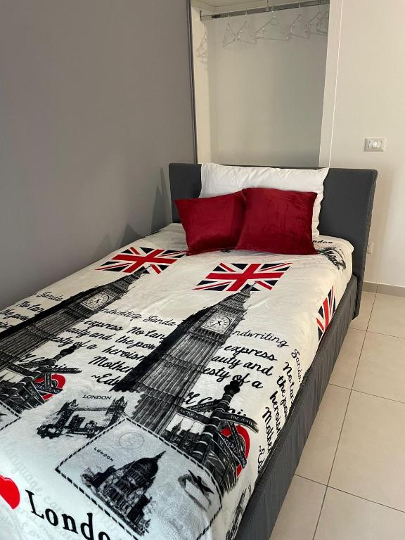 A bed or beds in a room at Affittacamere Iria