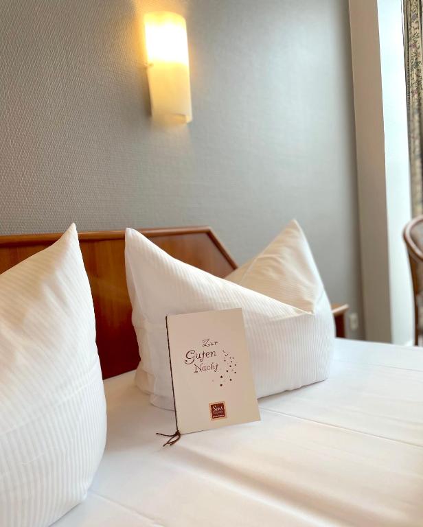 Postel nebo postele na pokoji v ubytování SensCity Hotel Berlin Spandau