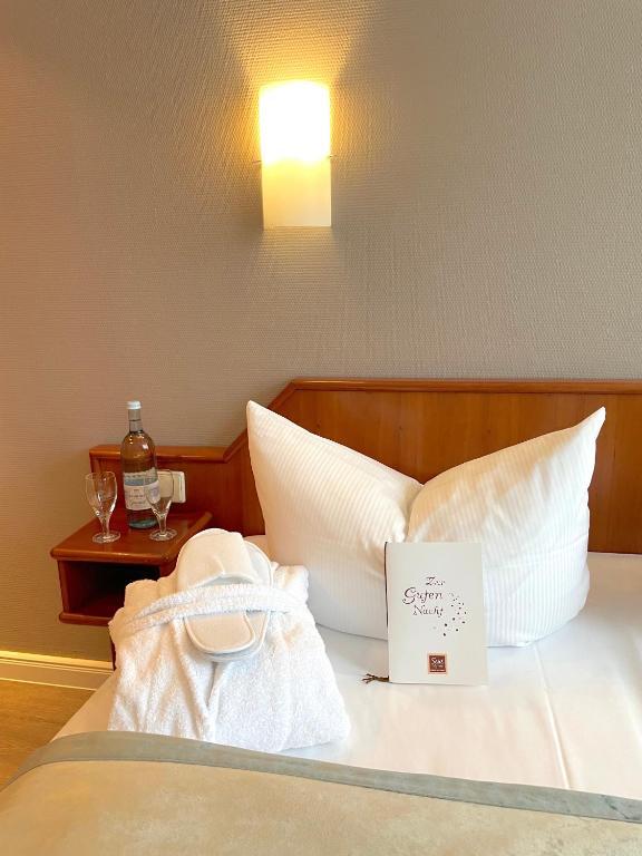 Postel nebo postele na pokoji v ubytování SensCity Hotel Berlin Spandau