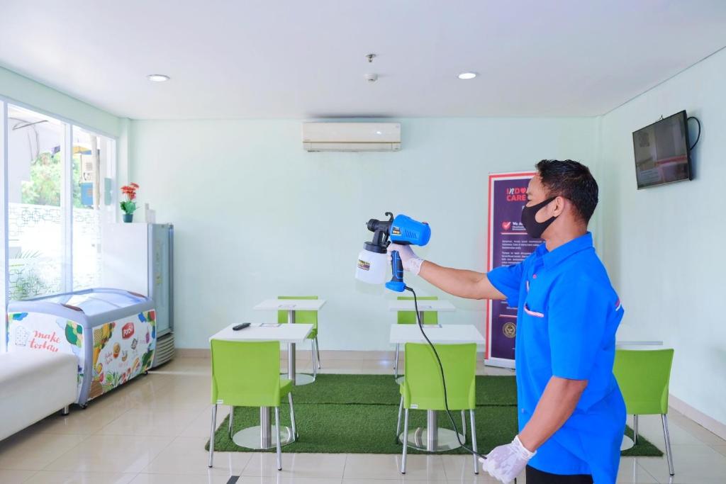 TV a/nebo společenská místnost v ubytování Cordex Hotel Ancol