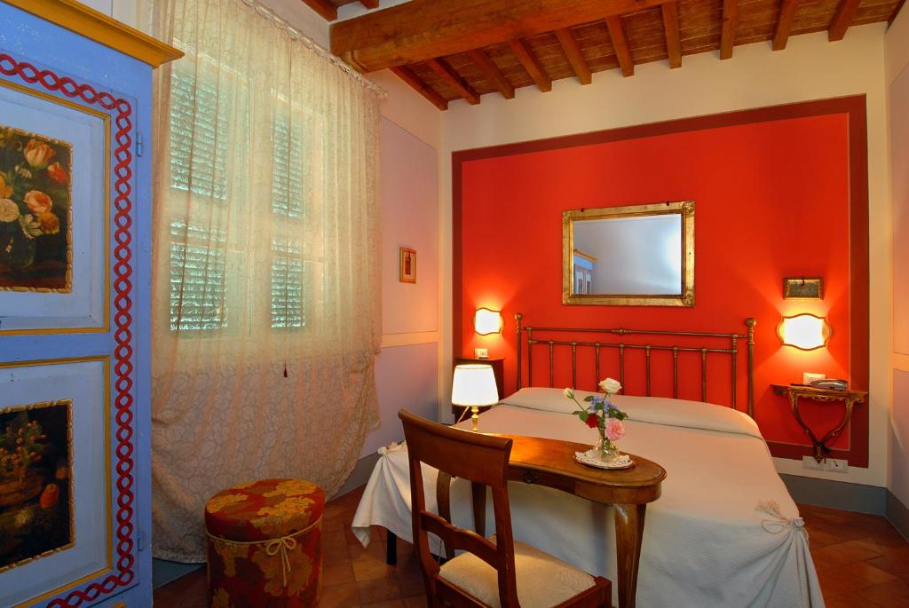 Postel nebo postele na pokoji v ubytování Il Rondò Boutique Hotel