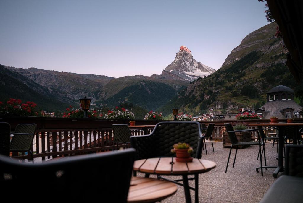 a balcony with a view of a mountain at Hotel Bella Vista Zermatt in Zermatt