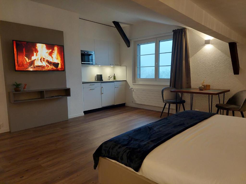 Postel nebo postele na pokoji v ubytování Apart-Hôtel Pont-de-Thielle