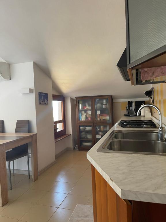 Kuchyňa alebo kuchynka v ubytovaní Relax Sea View Attic