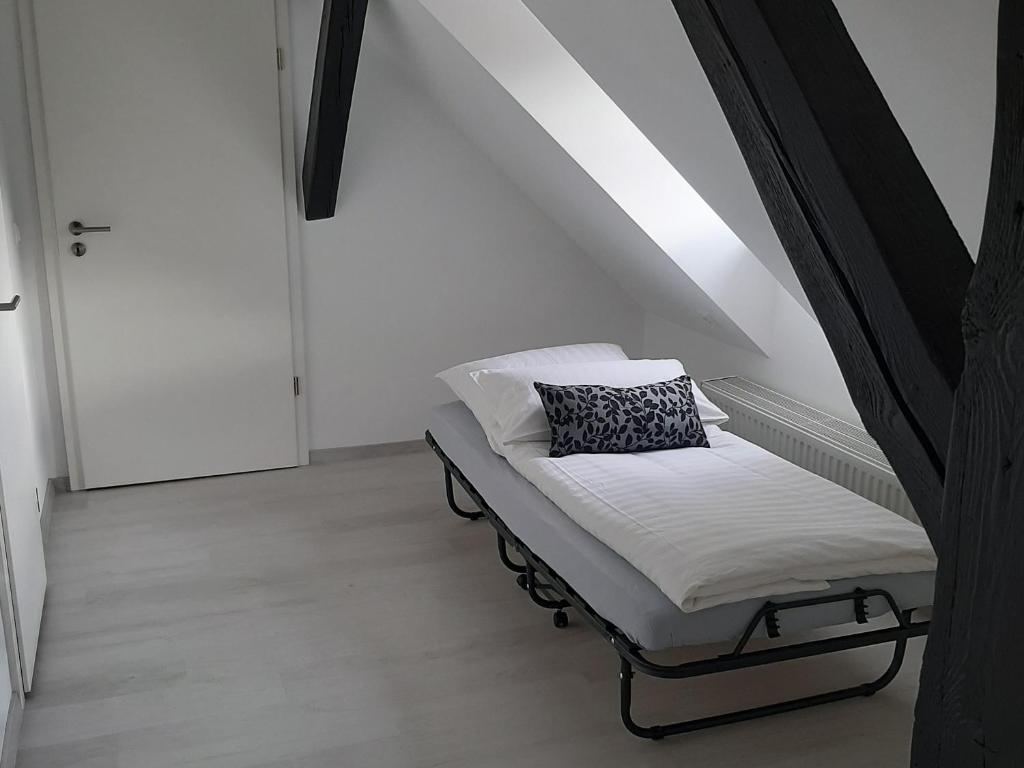 Postel nebo postele na pokoji v ubytování Bugenhagen - Classic Appartements