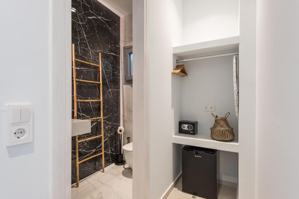 Koupelna v ubytování Rivière Residence Paros