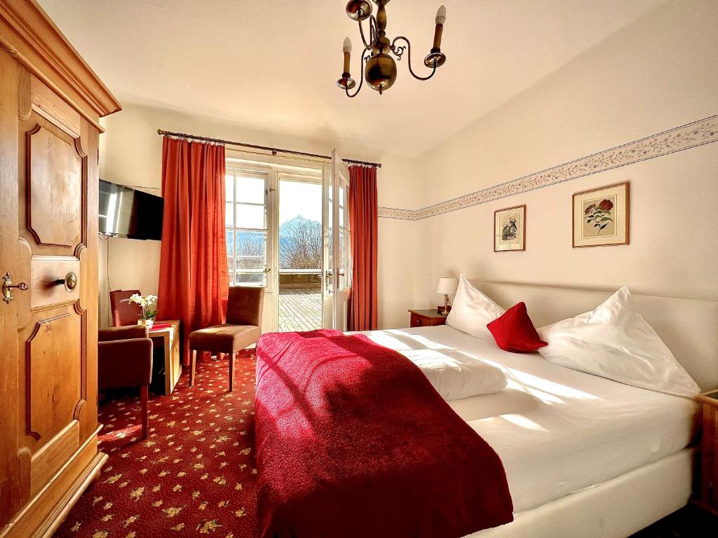 Postel nebo postele na pokoji v ubytování Hotel Restaurant Grünwalderhof