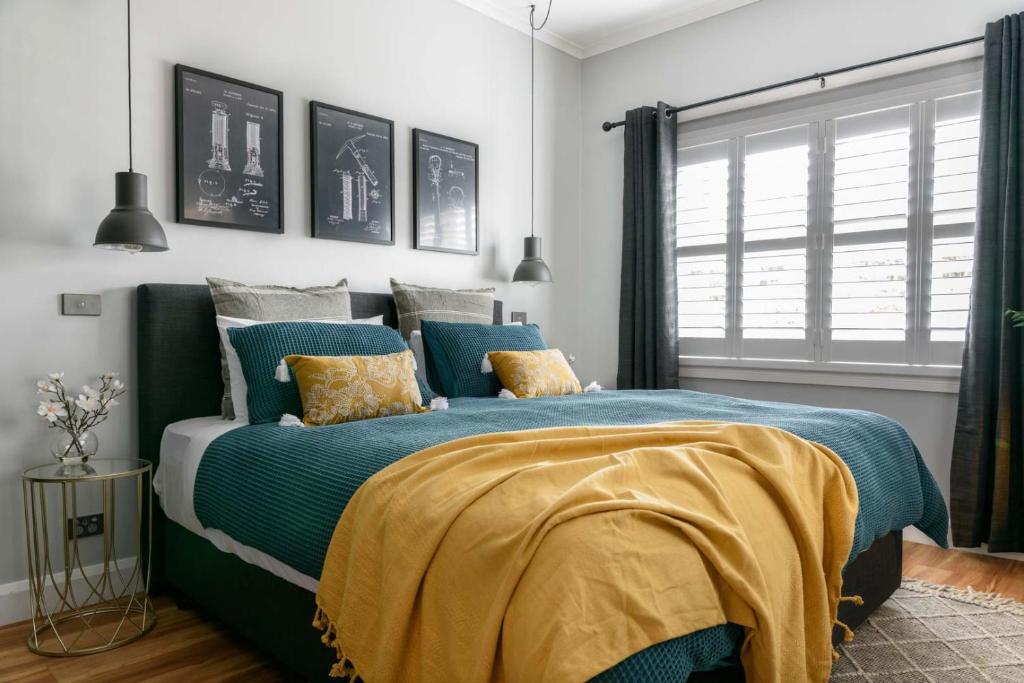 Posteľ alebo postele v izbe v ubytovaní Prospect Cottage Ballarat