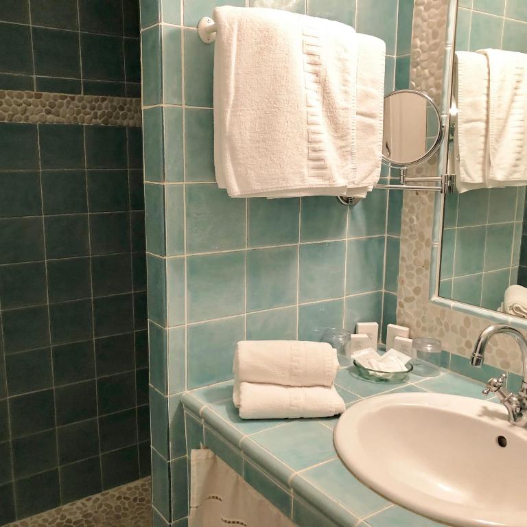 Koupelna v ubytování Hôtel l'Orangeraie