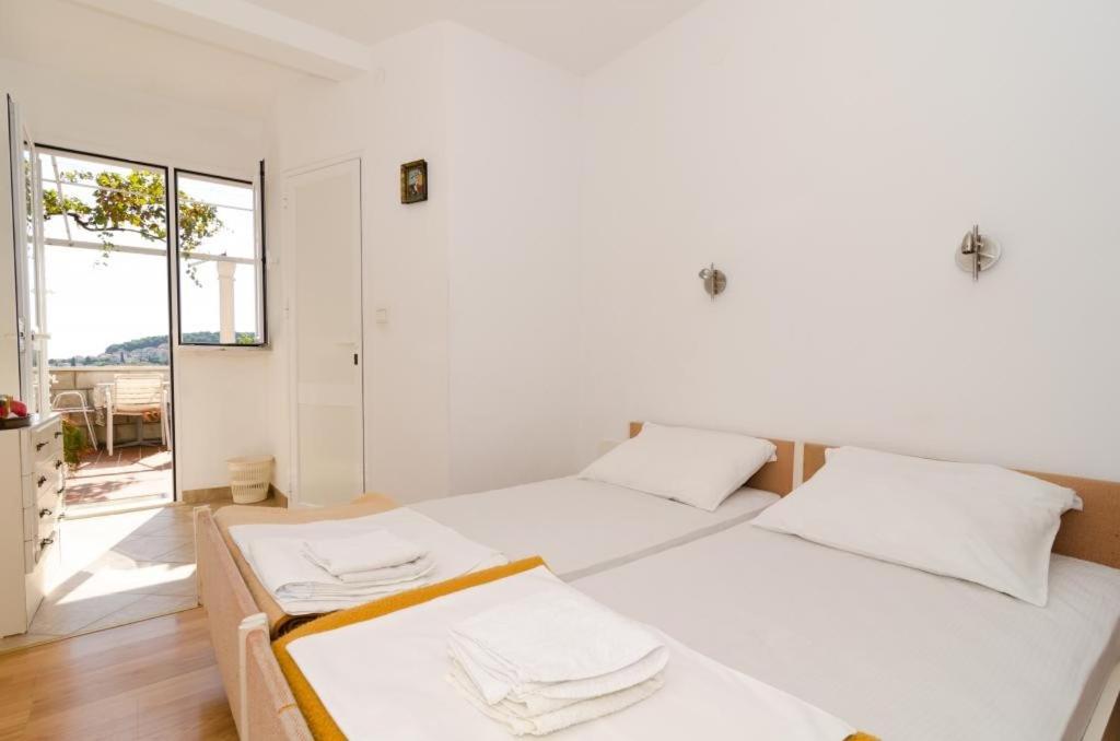 Postel nebo postele na pokoji v ubytování Guest House Misita