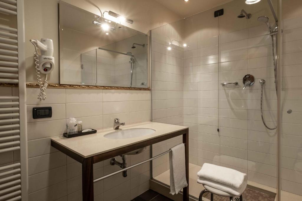 Koupelna v ubytování La Pieve Hotel