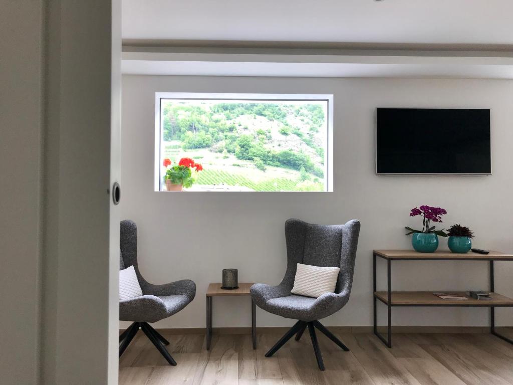 TV a/nebo společenská místnost v ubytování Hotel Quellenhof