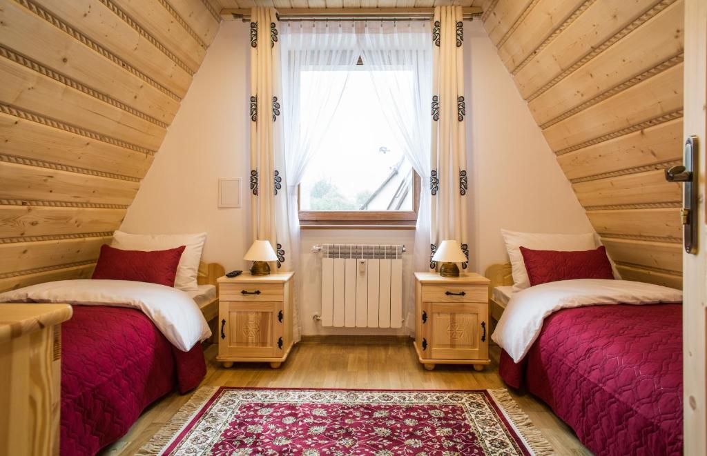 Posteľ alebo postele v izbe v ubytovaní ApartHost Tatra Panorama