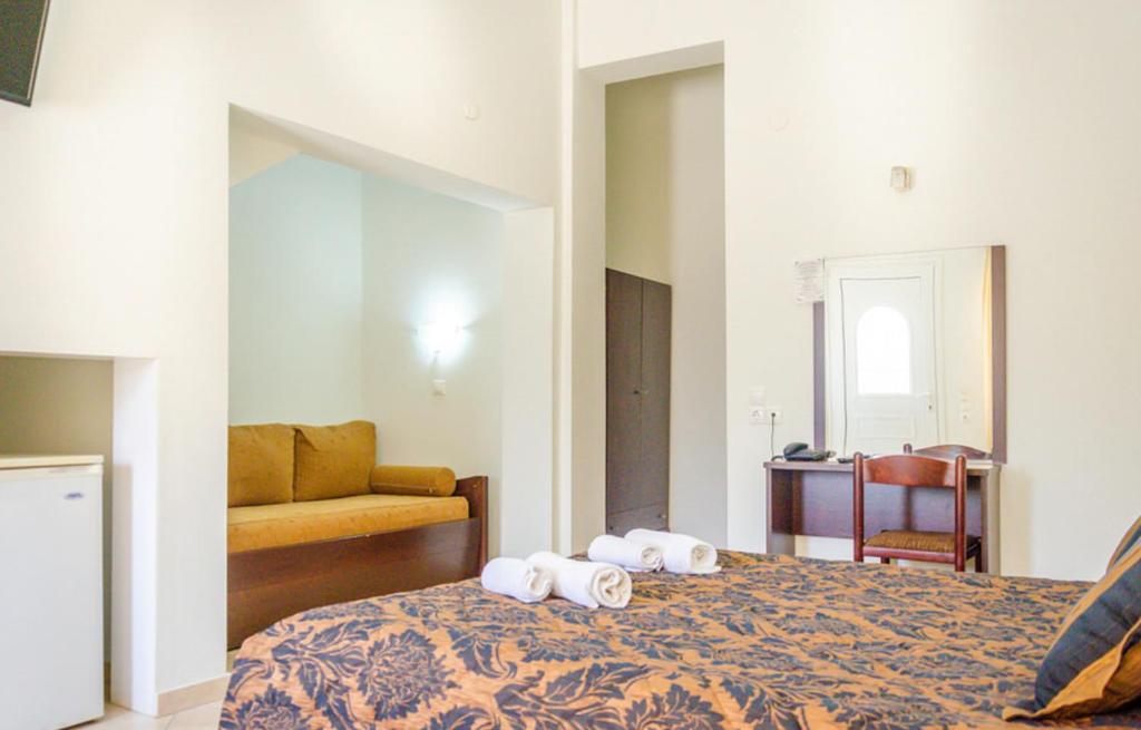 Postel nebo postele na pokoji v ubytování Delfini Hotel