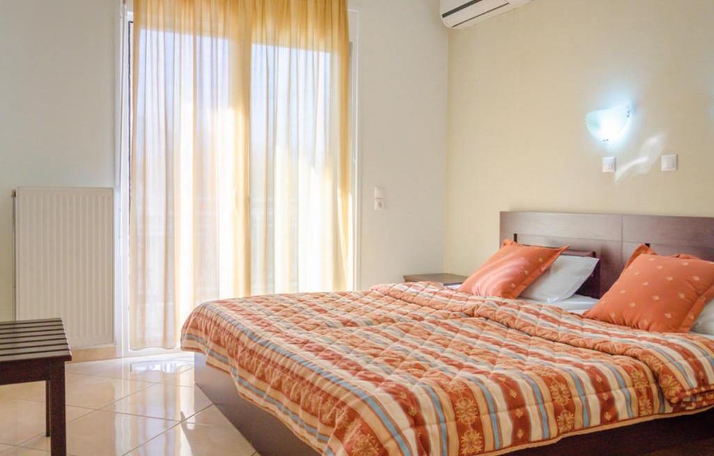 Postel nebo postele na pokoji v ubytování Delfini Hotel