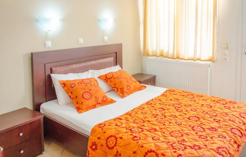 Postel nebo postele na pokoji v ubytování Delfini Hotel