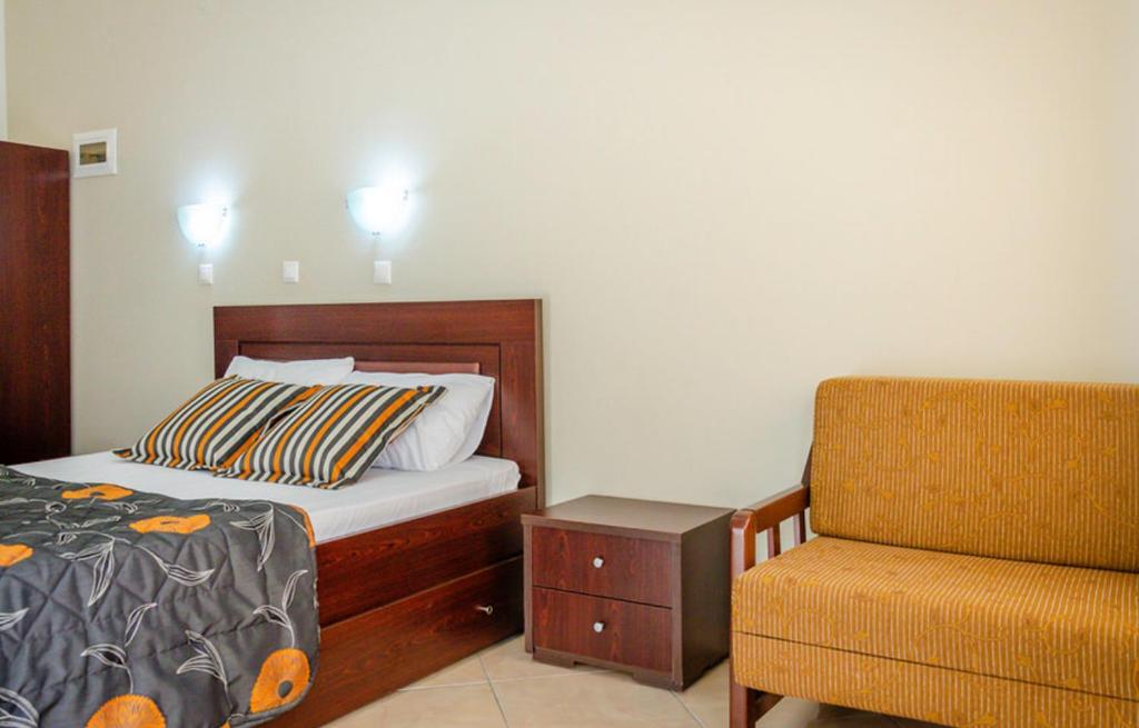 Postel nebo postele na pokoji v ubytování Delfini Hotel