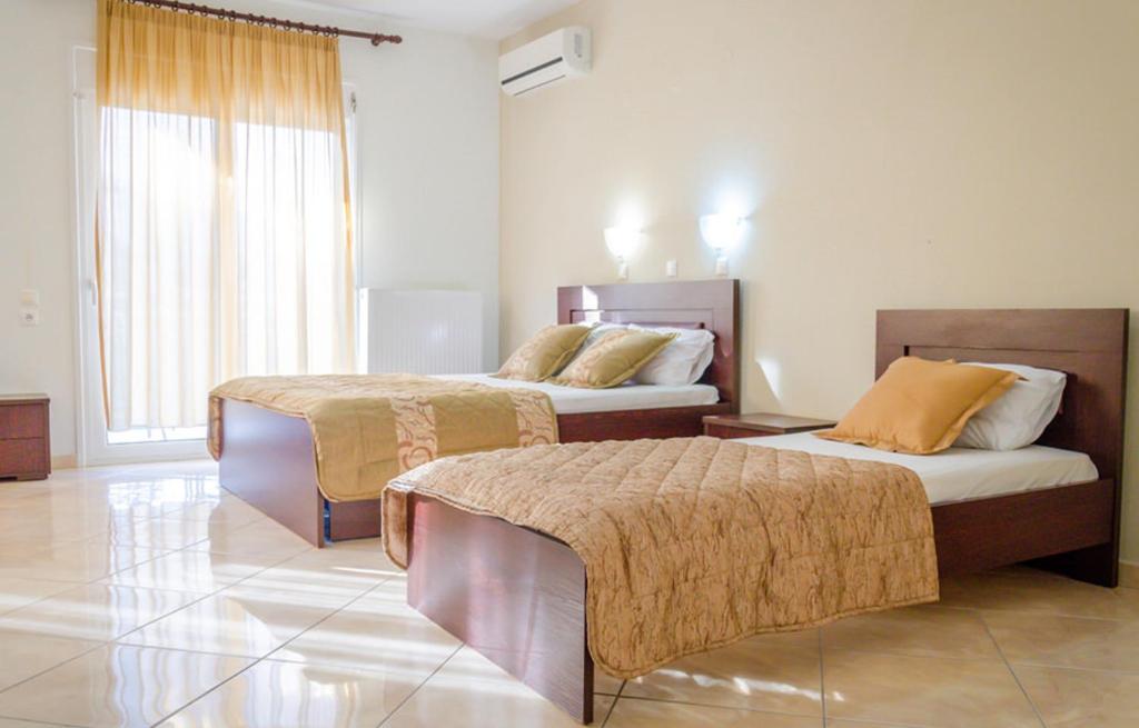 Postel nebo postele na pokoji v ubytování Delfini Hotel