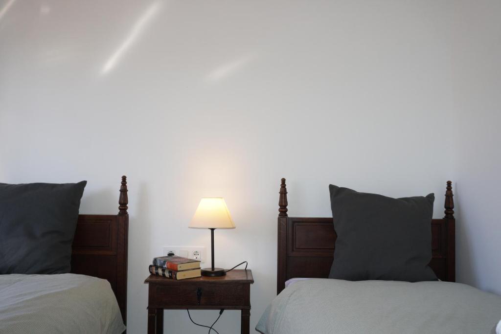 Postel nebo postele na pokoji v ubytování Villa Valeria Moralillo 1