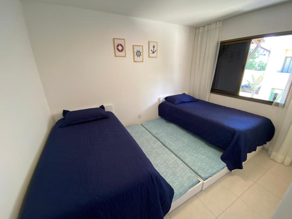 Postel nebo postele na pokoji v ubytování Ekoara Residence bangalô 07