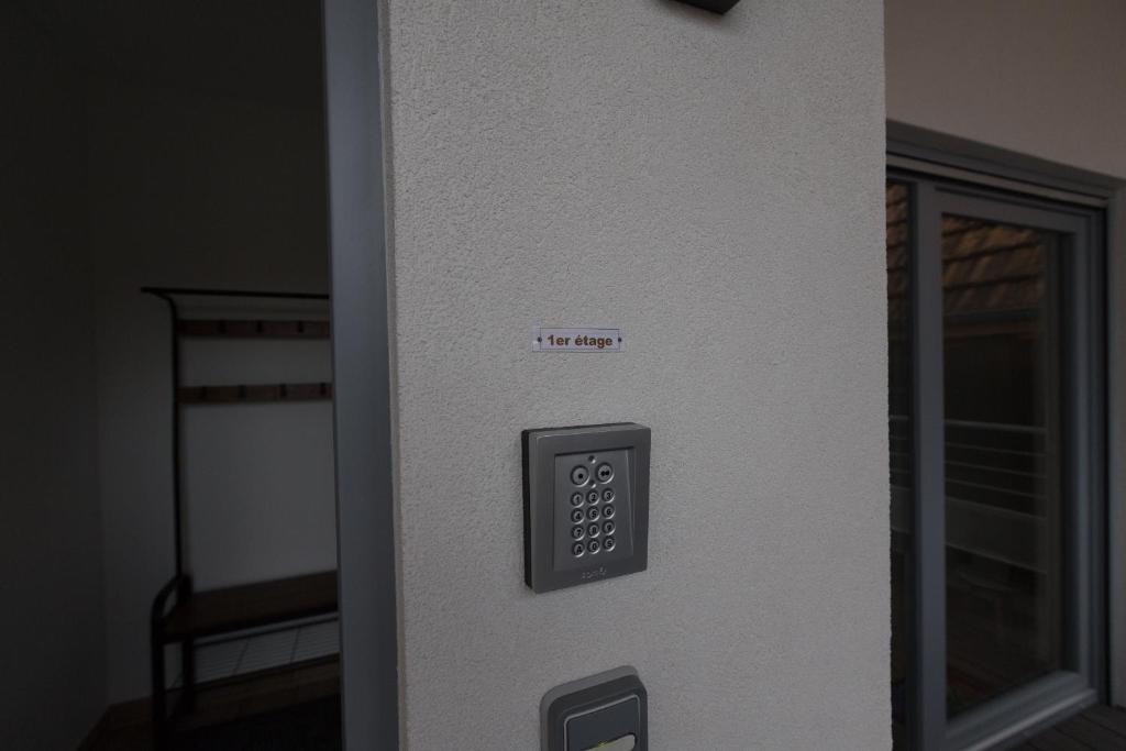 a control panel on the side of a building at Sollaris Appartement 1ère étage à 11km de Europa-Park in Friesenheim