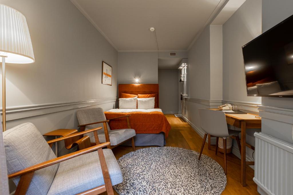 TV a/nebo společenská místnost v ubytování Hotel Poseidon