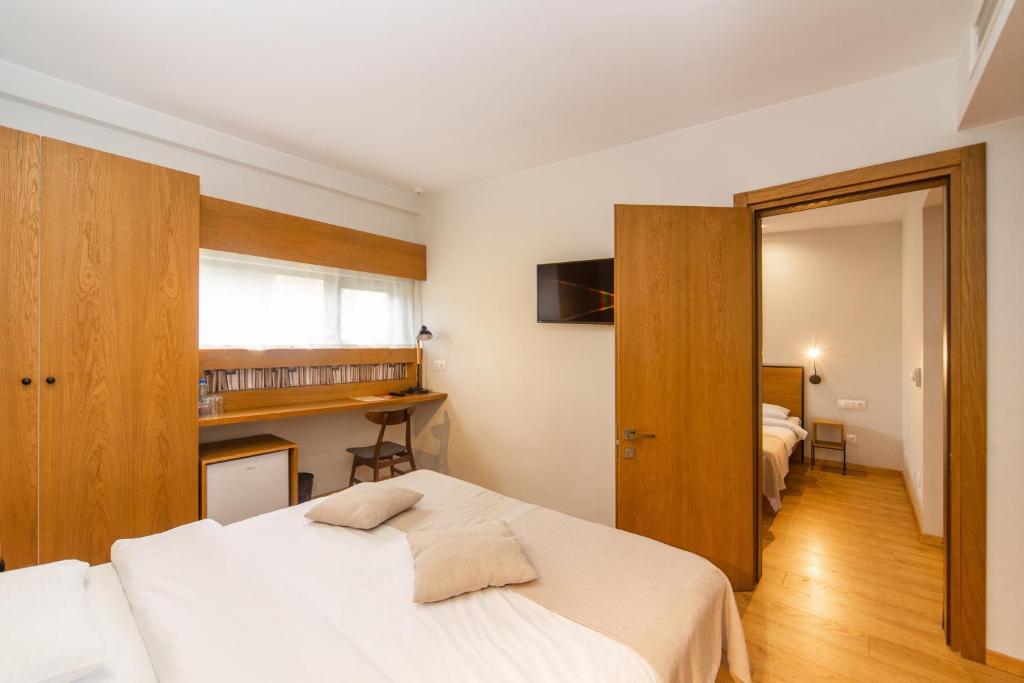 Postel nebo postele na pokoji v ubytování Urban Park Hotels