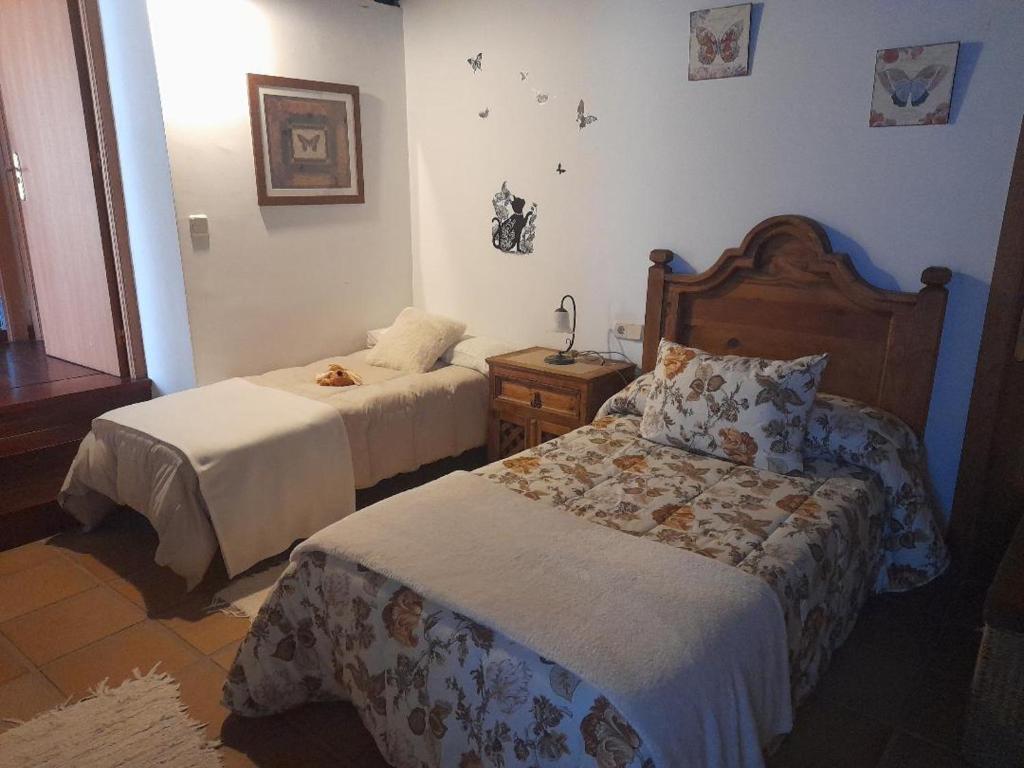Postel nebo postele na pokoji v ubytování Caserio de Fontes