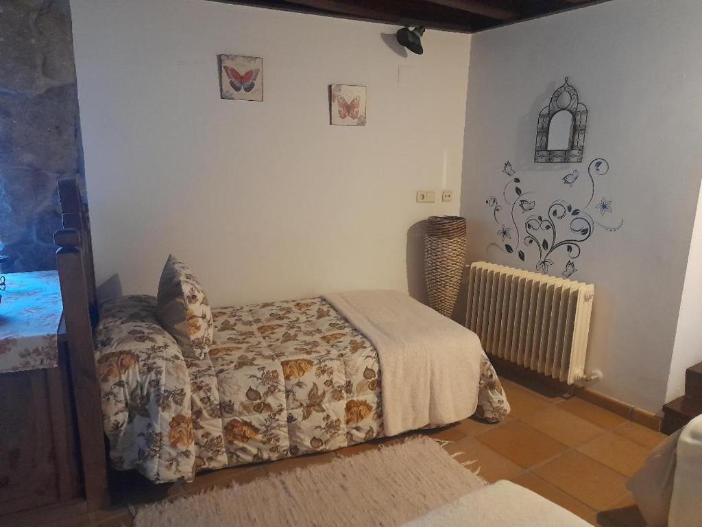 Postel nebo postele na pokoji v ubytování Caserio de Fontes
