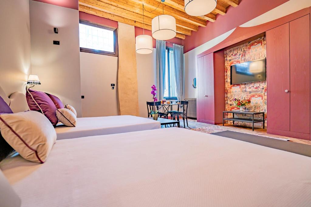 Posteľ alebo postele v izbe v ubytovaní Corte Rubbi 6 Deluxe Studio Apartment